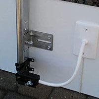 garage door opener sensor repair in Bowness