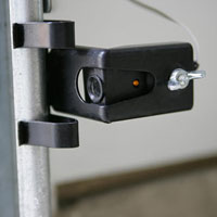 garage door opener photo eye sensor repair in Beiseker
